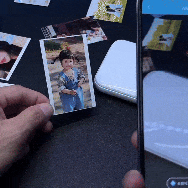 The printer also boasts an exciting AR feature. Scan your prints with the "HeyPhoto" app and watch as your photos come to life on your phone screen, adding an extra touch of magic to your memories.